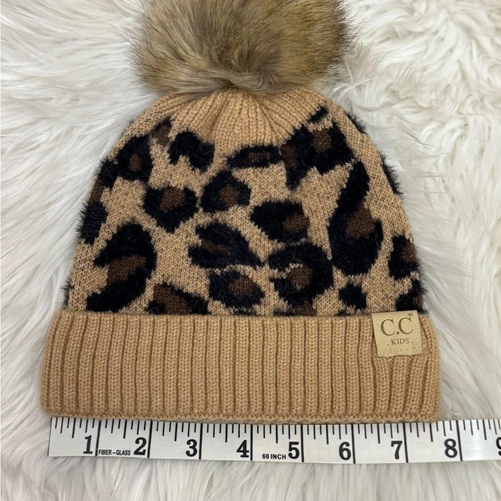 C.C Exclusives Soft Beanie Hat with Leopard Print Pattern and Faux Fur Pom